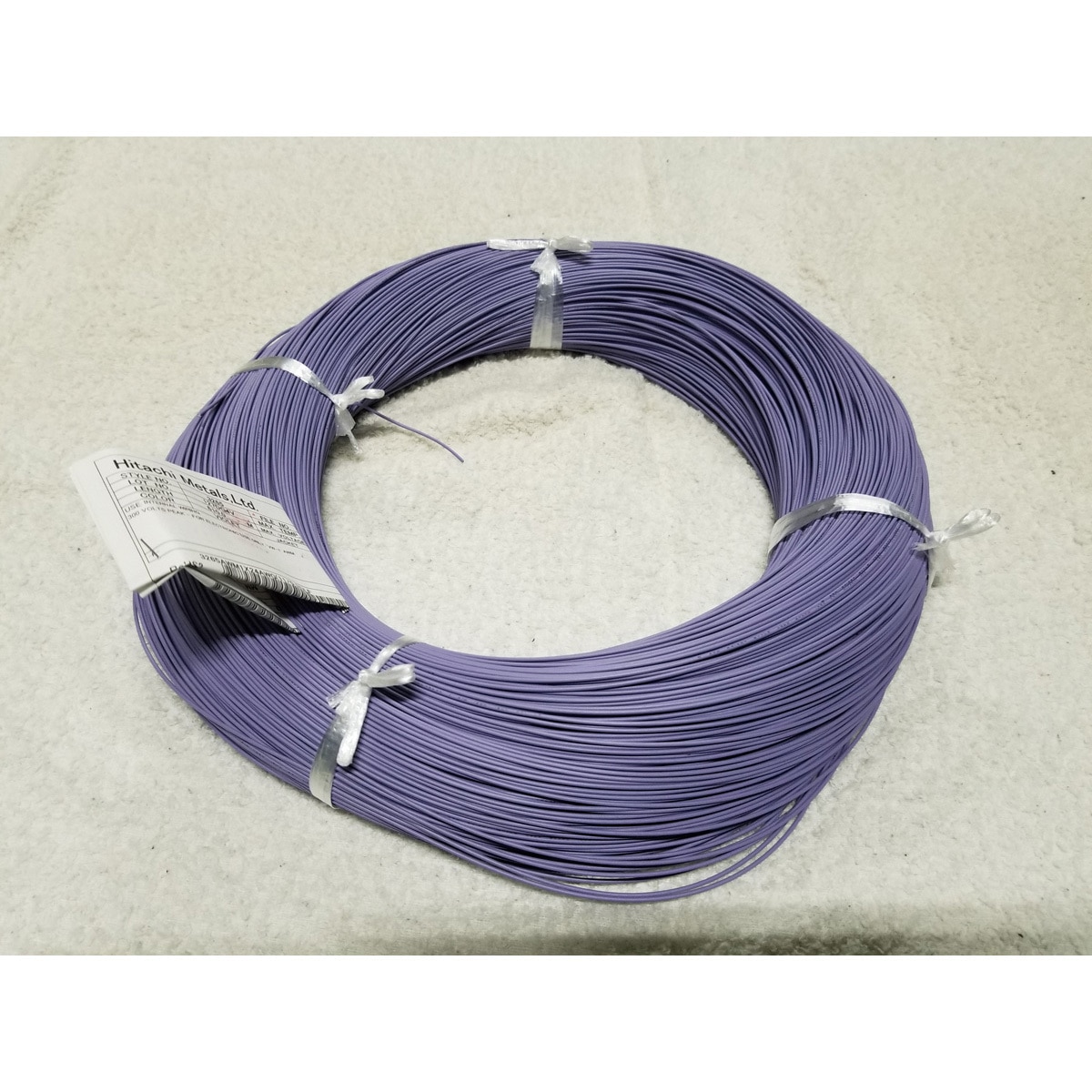 UL3265 #24 ムラサキ 非鉛照射架橋難燃PEワイヤ PROTERIAL(プロテリアル) 150V 導体外径0.61mm導体サイズ24AWG[mm<sup>2</sup>] 1巻(610m) 27,937円